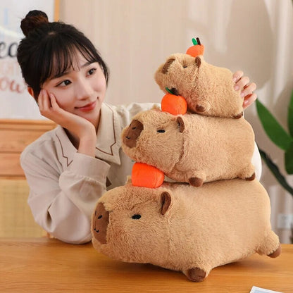 Cute Sleepy Capybara with Orange Plushie