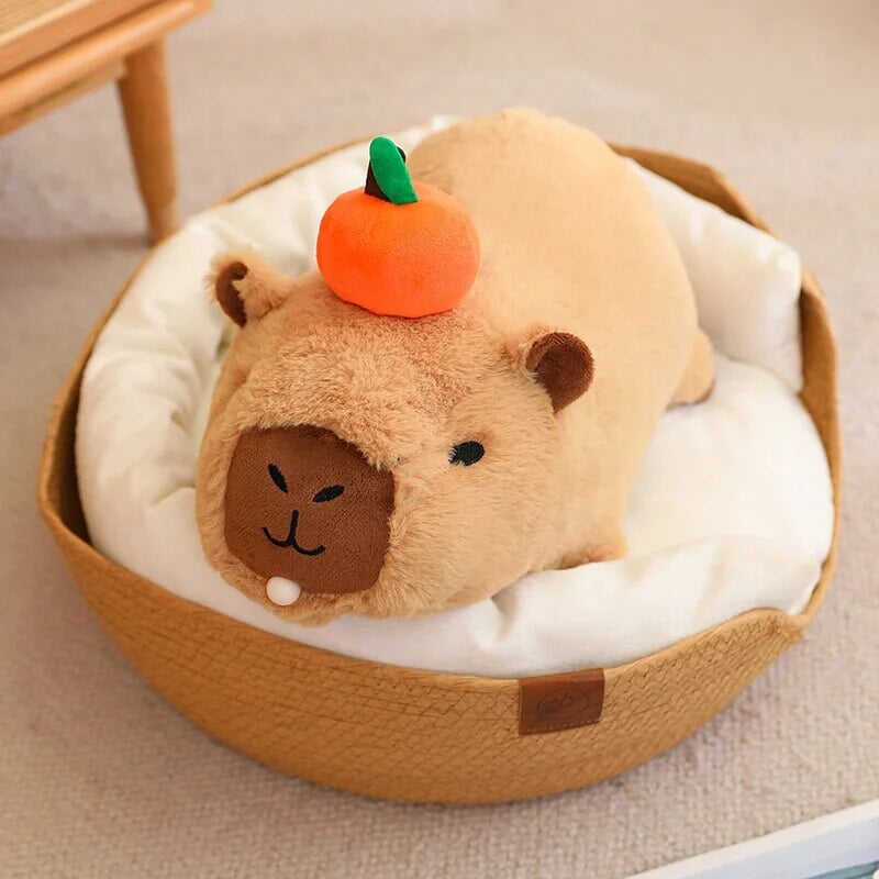 Cute Sleepy Capybara with Orange Plushie