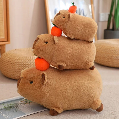 Cute Sleepy Capybara with Orange Plushie