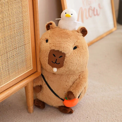 Cute Sleepy Capybara with Orange Plushie