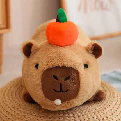 Cute Sleepy Capybara with Orange Plushie