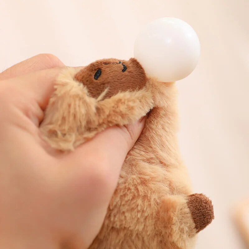 Cute Sleepy Capybara with Orange Plushie