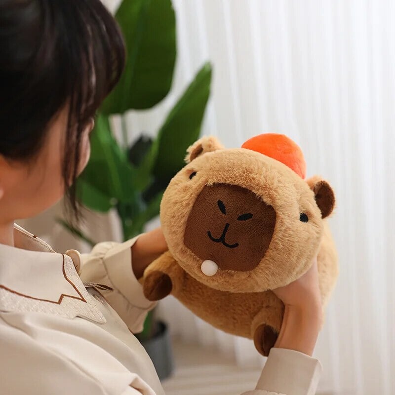 Cute Sleepy Capybara with Orange Plushie